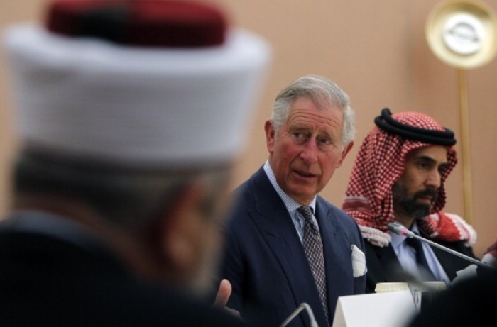 Prince Charles meets with Muslim leaders during a visit to a mosque in Amman, Jordan in 2013. (Photo by Ali Jarekji / AFP via Getty Images)