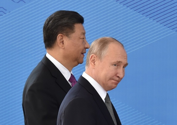 Russian President Vladimir Putin and Chinese President Xi Jinping attend a meeting of the Shanghai Cooperation Organisation (SCO) Council of Heads of State in Bishkek on June 14, 2019. (Photo by VYACHESLAV OSELEDKO/AFP via Getty Images)
