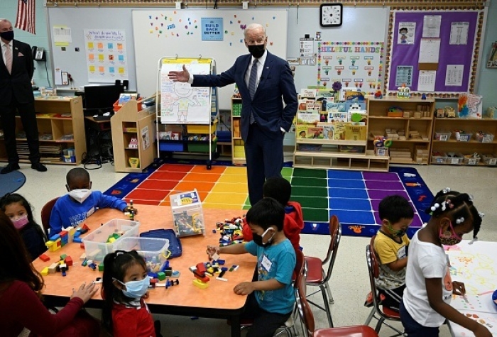 President Joe Biden talks to students, who don't appear to be listening, during a visit to a pre-K classroom at East End elementary school in North Plainfield, New Jersey on October 25, 2021. (Photo by ANDREW CABALLERO-REYNOLDS/AFP via Getty Images)