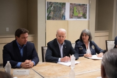 President Joe Biden speaks alongside Miami Dade County Mayor Daniella Levine Cava (R) and Florida Governor Ron DeSantis (L) about the collapse of the 12-story Champlain Towers South condo building in Surfside, during a briefing in Miami Beach, Florida, July 1, 2021. (Photo by SAUL LOEB/AFP via Getty Images)