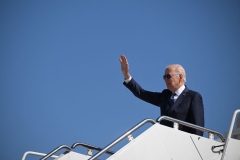 President Joe Biden waves as he boards Air Force One before departing Joint Base Andrews in Maryland on October 7, 2022. - Biden is heading to Hagerstown, Maryland, where he will speak on the economy. (Photo by MANDEL NGAN/AFP via Getty Images)