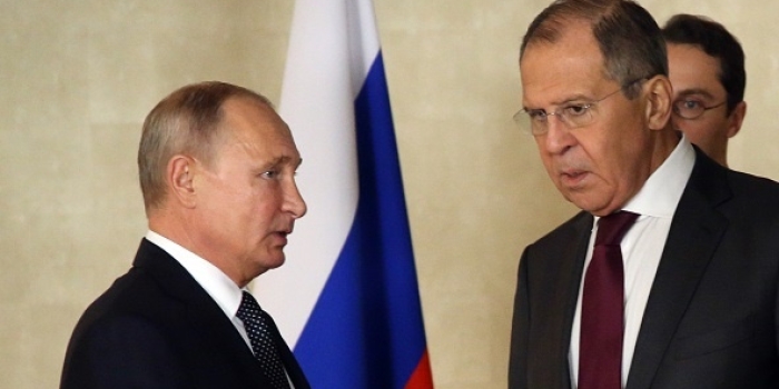 Russian President Vladimir Putin and Foreign Minister Sergei Lavrov. (Photo by Mikhail Svetlov/Getty Images)